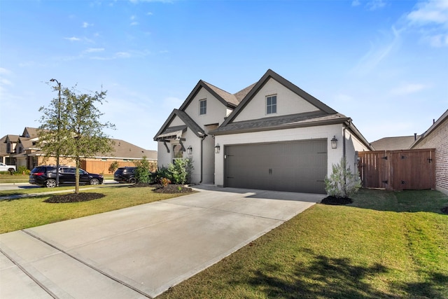 view of front of home with a front lawn and a garage