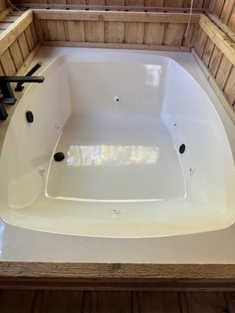 bathroom with a washtub