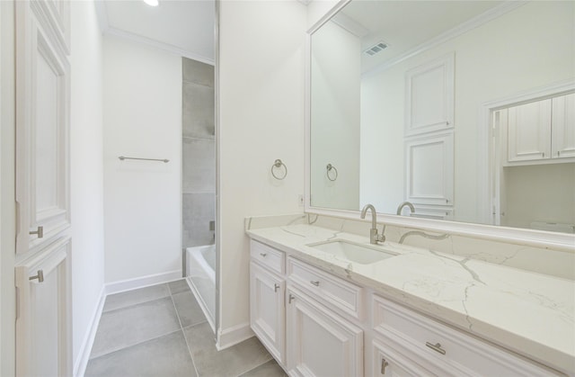 bathroom with tile patterned floors, crown molding, vanity, and  shower combination