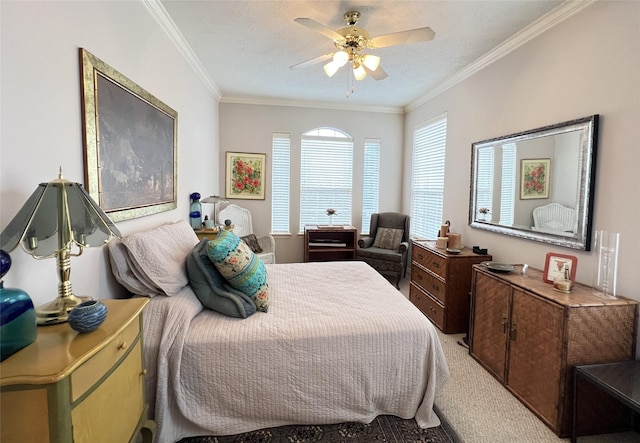 carpeted bedroom featuring a textured ceiling, ceiling fan, and crown molding