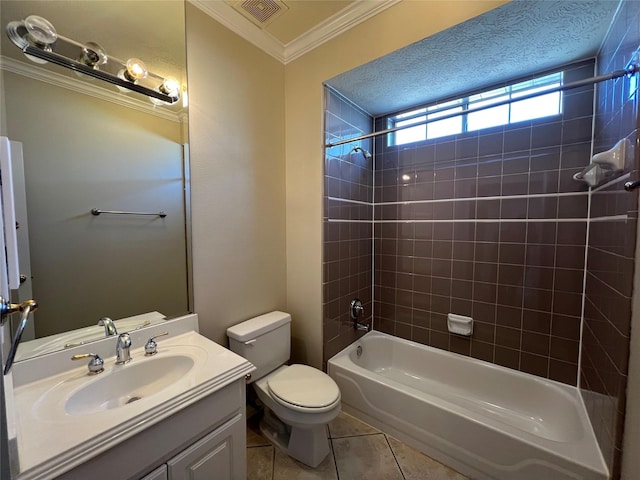 full bathroom featuring vanity, crown molding, tile patterned flooring, tiled shower / bath combo, and toilet