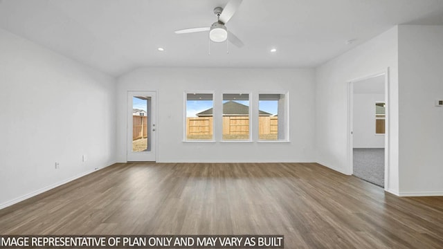 unfurnished living room with hardwood / wood-style flooring, ceiling fan, and lofted ceiling