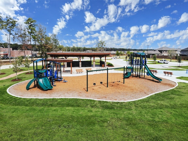 view of play area featuring a lawn