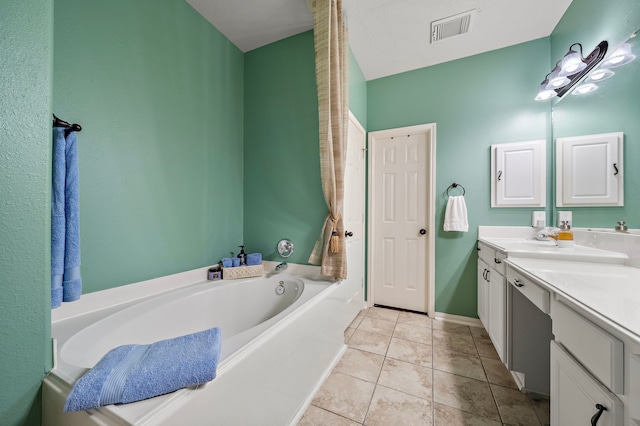 bathroom with tile patterned flooring, vanity, and a tub to relax in