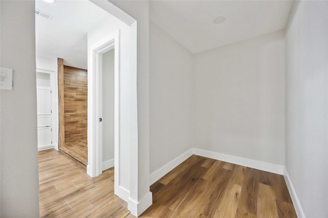 hallway featuring hardwood / wood-style flooring