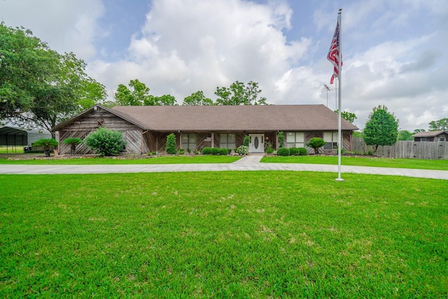 ranch-style home with a front yard