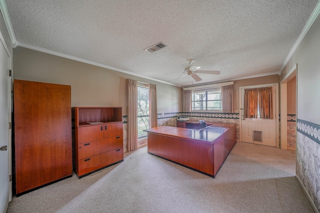 bedroom with light carpet, a textured ceiling, ceiling fan, and ornamental molding