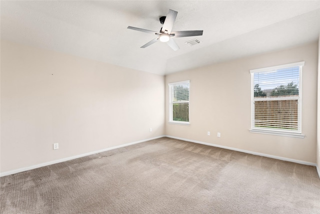 carpeted empty room with ceiling fan