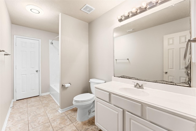 full bathroom featuring washtub / shower combination, tile patterned flooring, a textured ceiling, toilet, and vanity