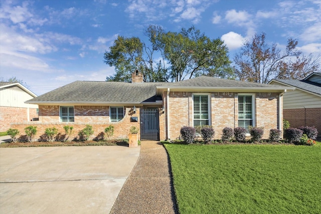 ranch-style home with a front yard