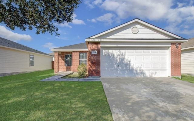 ranch-style home featuring a front yard and a garage