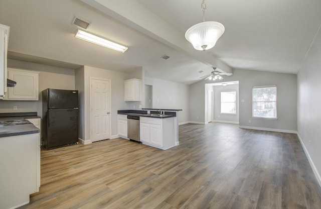 kitchen featuring black refrigerator, stainless steel dishwasher, ceiling fan, decorative light fixtures, and white cabinets