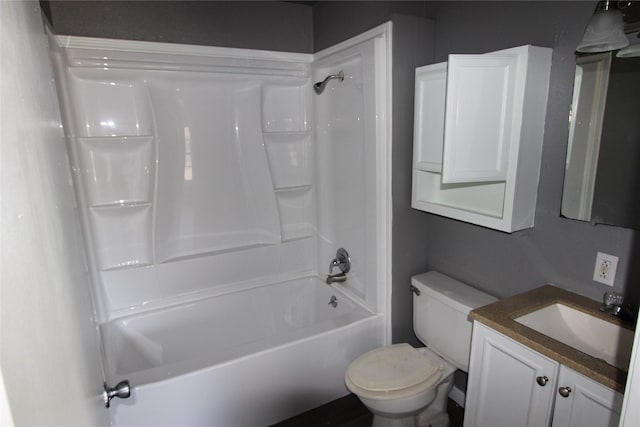 full bathroom featuring vanity, toilet, and shower / tub combination