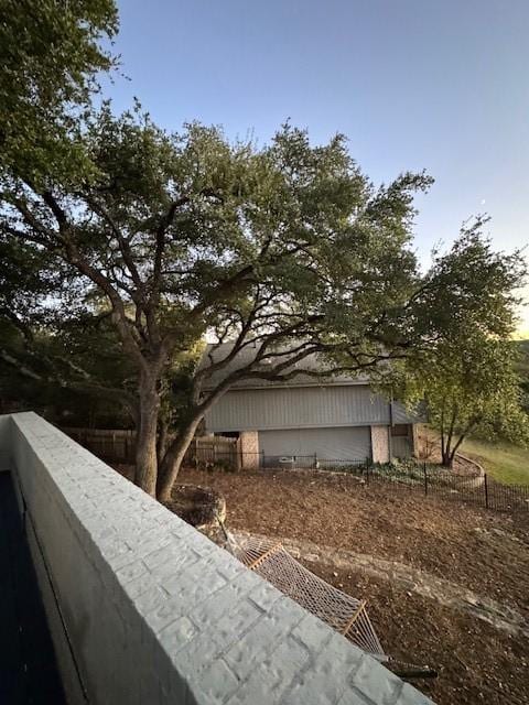 view of property exterior featuring a balcony