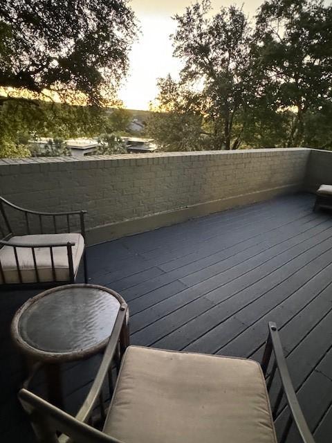 view of balcony at dusk