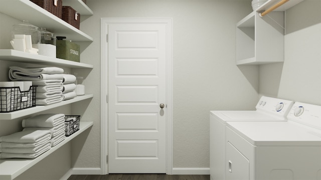 laundry area featuring independent washer and dryer and dark wood-type flooring