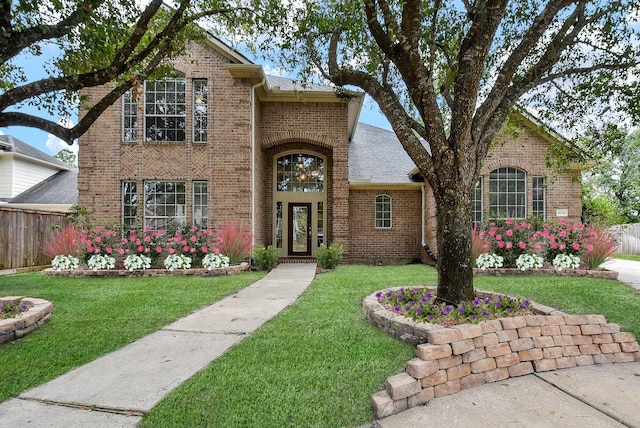 view of front of property with a front lawn