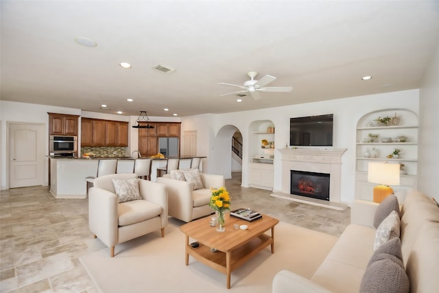 living room with ceiling fan