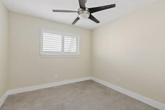 spare room with ceiling fan