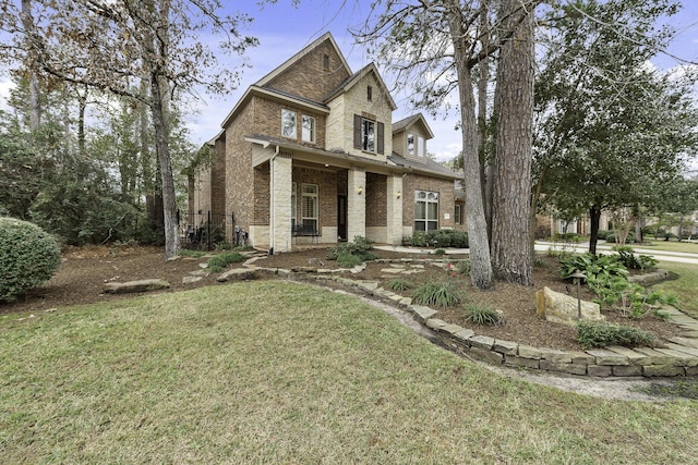 view of front of home featuring a front lawn