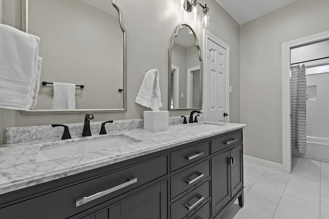 bathroom featuring shower / bathtub combination with curtain, tile patterned flooring, and vanity