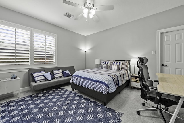 carpeted bedroom featuring ceiling fan