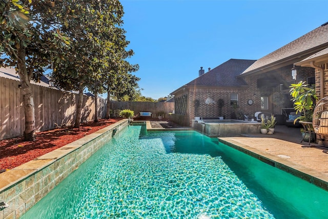 view of pool with a patio