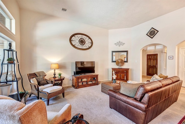 living room with light colored carpet