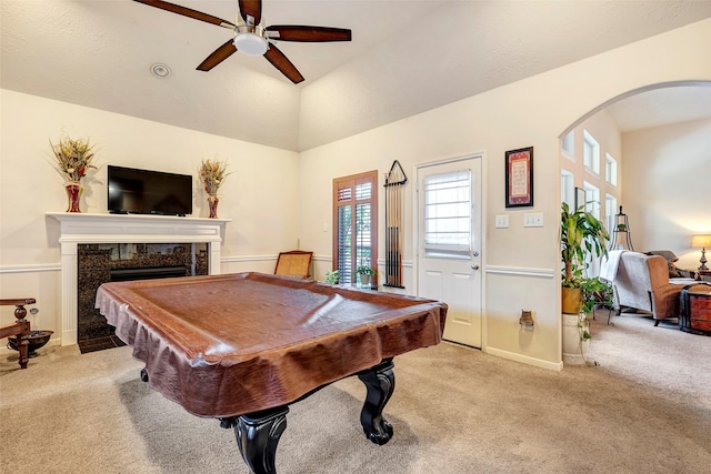 game room with light carpet, a fireplace, lofted ceiling, and billiards