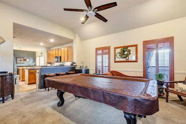 recreation room featuring a wealth of natural light, light carpet, lofted ceiling, and pool table