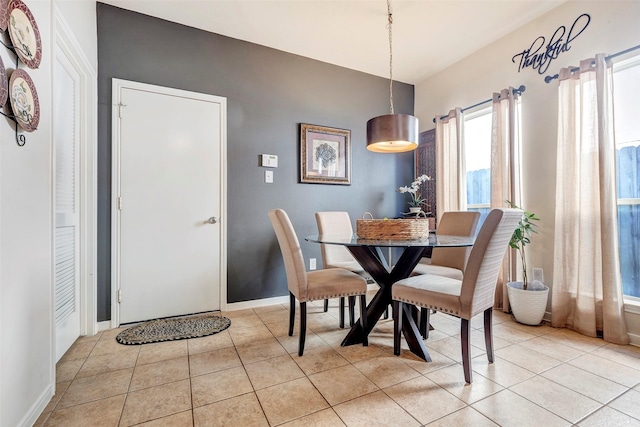 dining room featuring light tile patterned floors