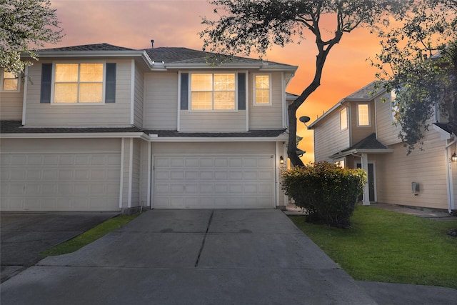 view of front of home with a garage