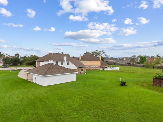 view of yard with fence