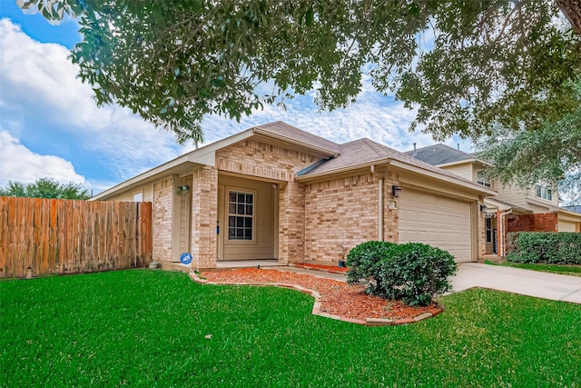 single story home featuring a garage and a front lawn