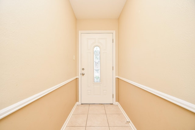 entryway featuring light tile patterned flooring