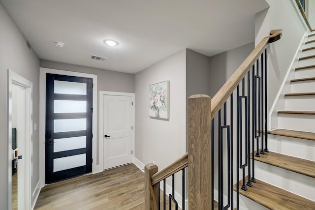 entrance foyer with light hardwood / wood-style floors