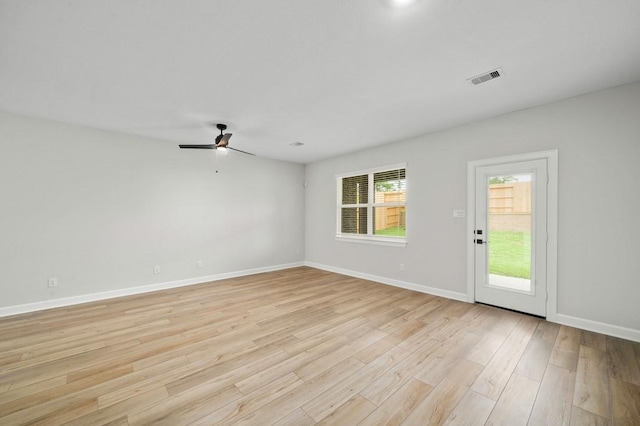 unfurnished room with ceiling fan and light hardwood / wood-style flooring