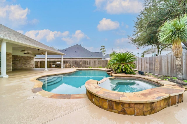 view of pool featuring an in ground hot tub, ceiling fan, and a patio