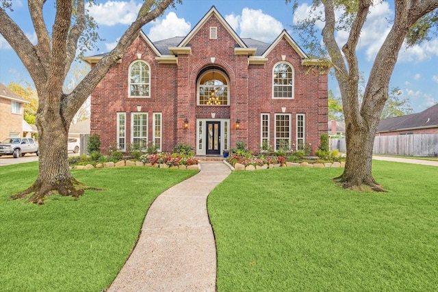 view of front of home featuring a front lawn