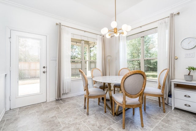 dining area featuring a healthy amount of sunlight and a notable chandelier