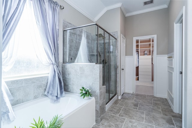 bathroom with separate shower and tub and crown molding