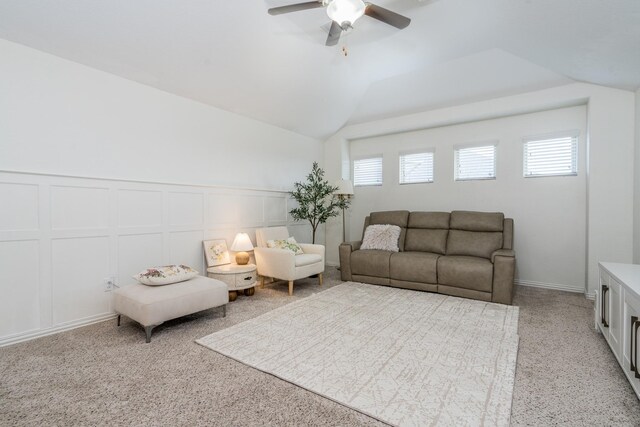 living room with ceiling fan and lofted ceiling