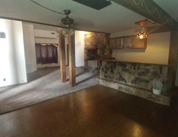 basement with ceiling fan