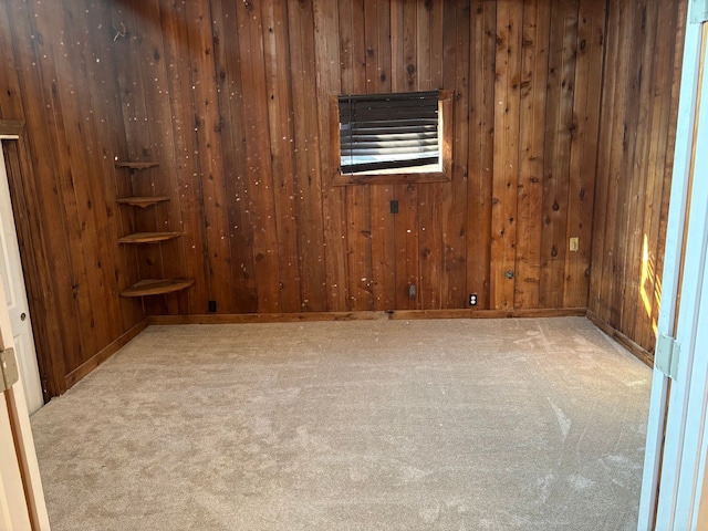 unfurnished room with light colored carpet