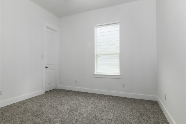 unfurnished room featuring carpet floors