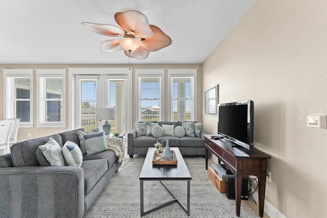 living room featuring ceiling fan