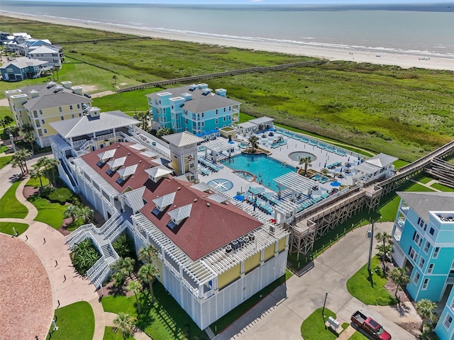 aerial view with a view of the beach and a water view