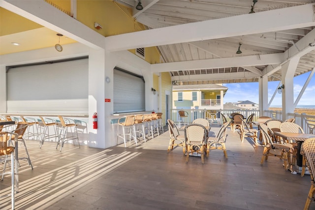 view of patio with an outdoor bar