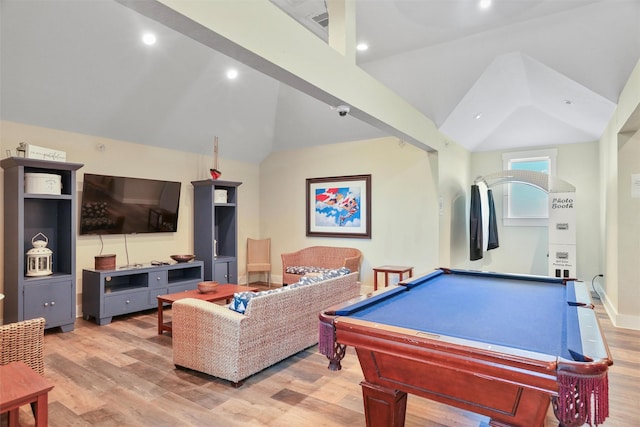 rec room with light wood-type flooring, billiards, and vaulted ceiling