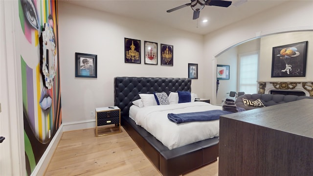 bedroom featuring ceiling fan and light hardwood / wood-style flooring